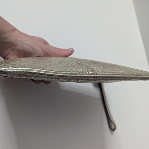 Like new Coach Metallic Champagne Gold Wristlet Clutch - Picture 11 of 16